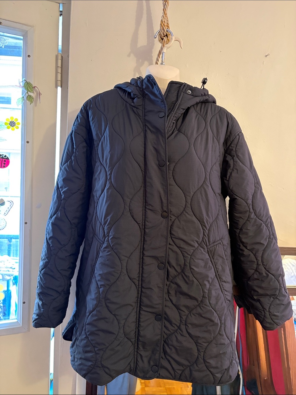 Quilted Hooded Puffer Jacket in Black